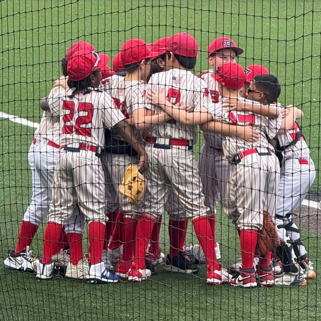 FB Braves players celebrating together as a team